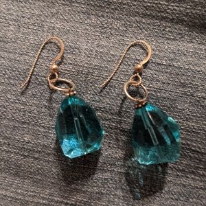 Sterling silver earrings w/ large blue glass stone